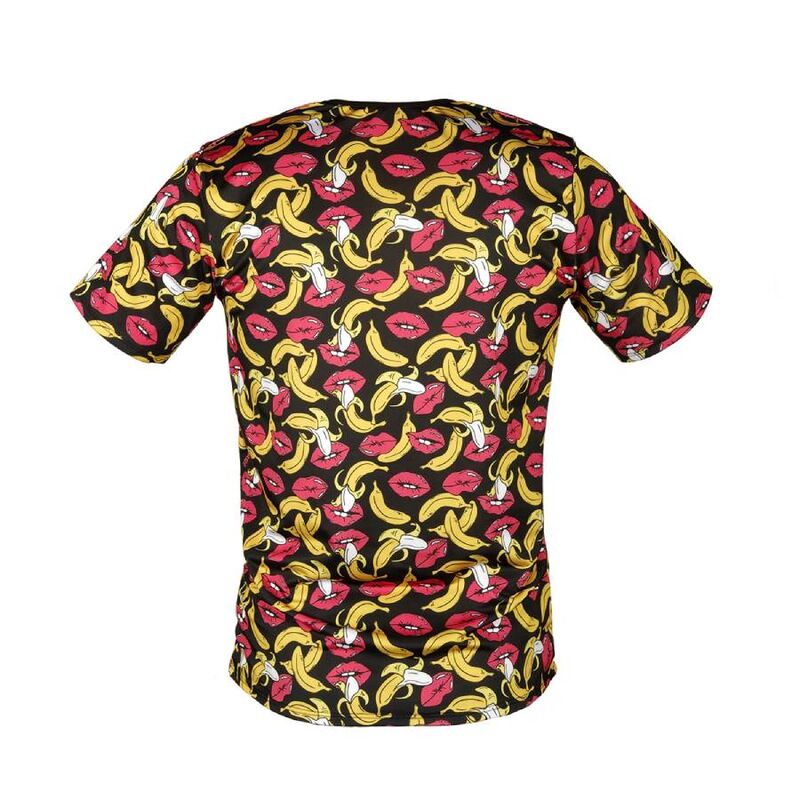 A man wearing a multicolored t-shirt with a banana pattern and the brand name 'ANAIS' visible on the waistband of the shorts. Anais Men Banana T-Shirt soft lycra men's fitted top with all-over banana print3