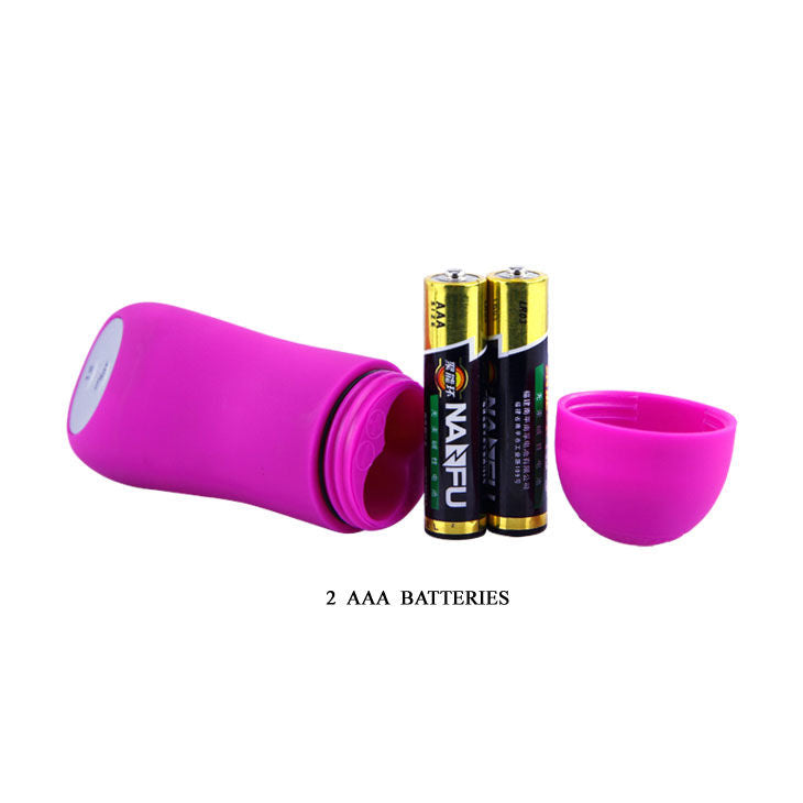 A lilac-colored, butterfly-shaped clitoral stimulator with a remote control. The stimulator has a smooth, peach-like texture and antenna-like features on its wings.5ty555