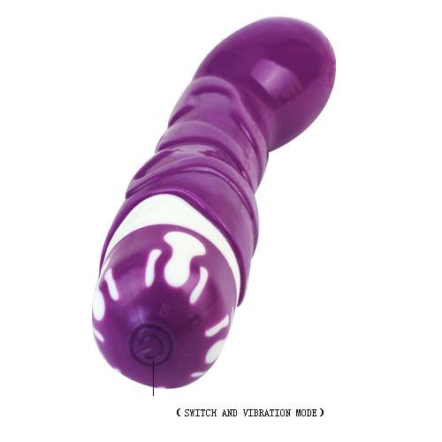 A purple, silicone vibrator with a curved design, featuring a white base and buttons. The vibrator appears soft and flexible with a smooth surface. Target your pleasure with Baile Realistic Cock G-Spot Sensation. Soft silicone, 10 vibration rhythms, powerful tip motor. Ships UK & EU. Order now!3