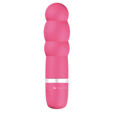 Enjoy precise pleasure with the B Swish Classic Clitor Stimulator. Ergonomic, waterproof, and silky soft silicone design with adjustable vibrations. Available in blue, pink, and purple.3