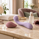 Ergonomic lavender and rose sex toys displayed with personal lubricant and comfort accessories on a luxury dressing table.