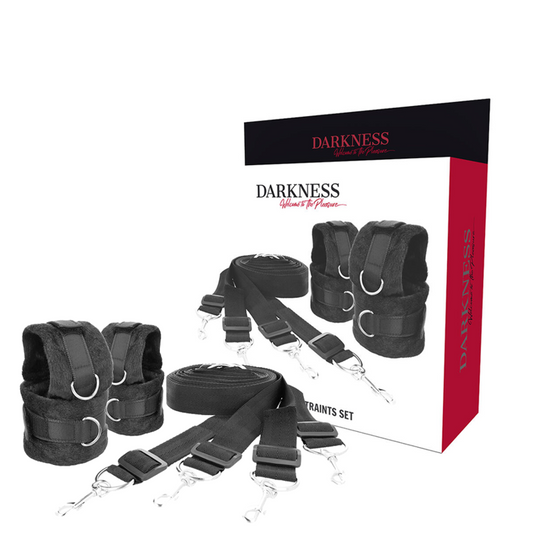 Bed restraint set with padded cuffs and straps, featured in our bondage furniture buying guide