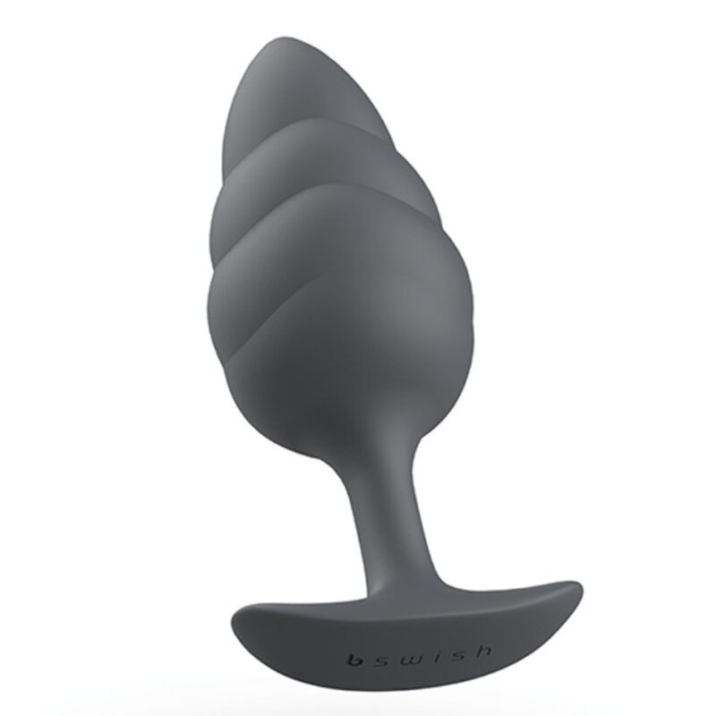 Experience new sensations with the B Swish Bfilled Butt Plug. Tapered tip, wave texture, body-safe silicone, and free-floating weight for ultimate pleasure.3