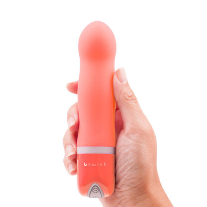 Experience the silky-smooth B Swish Coral Vibrator with 6 vibration functions. Hypoallergenic silicone, waterproof, and perfect for solo or couple play.4