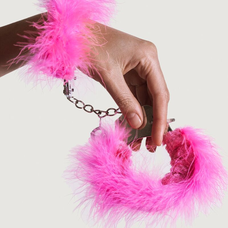 Elevate your BDSM play with Adrien Lastic Feathered Metal Handcuffs. Soft lining, sturdy chain, and two keys for secure and sensual restraint. Black, white, or pink.4