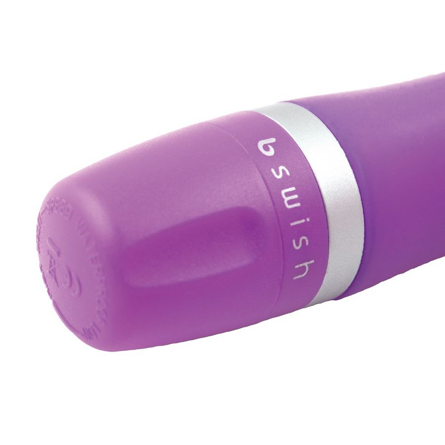 Experience versatile pleasure with the B Swish Bcute Clitoral Stimulator. Compact, submersible, and made with silky silicone. Adjustable vibrations in blue, pink, or purple.2