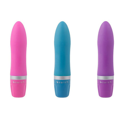 Experience versatile pleasure with the B Swish Bcute Clitoral Stimulator. Compact, submersible, and made with silky silicone. Adjustable vibrations in blue, pink, or purple.5