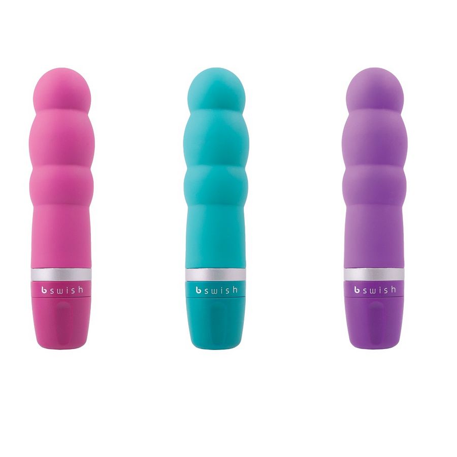 Enjoy precise pleasure with the B Swish Classic Clitor Stimulator. Ergonomic, waterproof, and silky soft silicone design with adjustable vibrations. Available in blue, pink, and purple.11