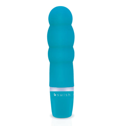 Enjoy precise pleasure with the B Swish Classic Clitor Stimulator. Ergonomic, waterproof, and silky soft silicone design with adjustable vibrations. Available in blue, pink, and purple.