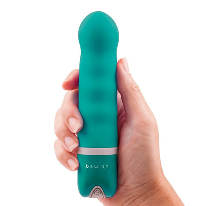 Experience intense pleasure with the B Swish Bdesired Deluxe Perla. Beaded shaft, 6 pulsating functions, waterproof, and hypoallergenic silicone for ultimate satisfaction.7