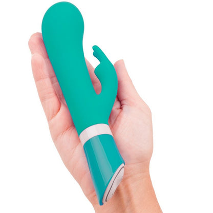 Experience dual pleasure with the Bwild Deluxe Bunny Rabbit Vibrator. 6 vibration modes, waterproof, body-safe silicone, and dual motors for intense stimulation.8