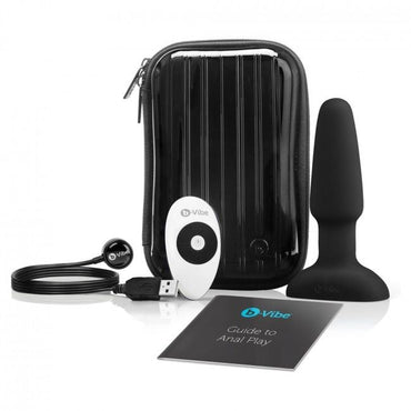 Experience rimming and prostate pleasure with B-Vibe Rimming Anal Plug Two. Rotating beads, strong vibrations, remote control, and body-safe silicone design.1
