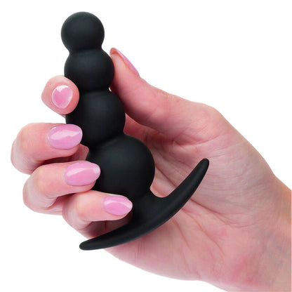 CalExotics Beaded Butt Plug offers a soft silicone design with flexible graduated beads and an easy-pull handle for thrilling, body-safe anal stimulation.4