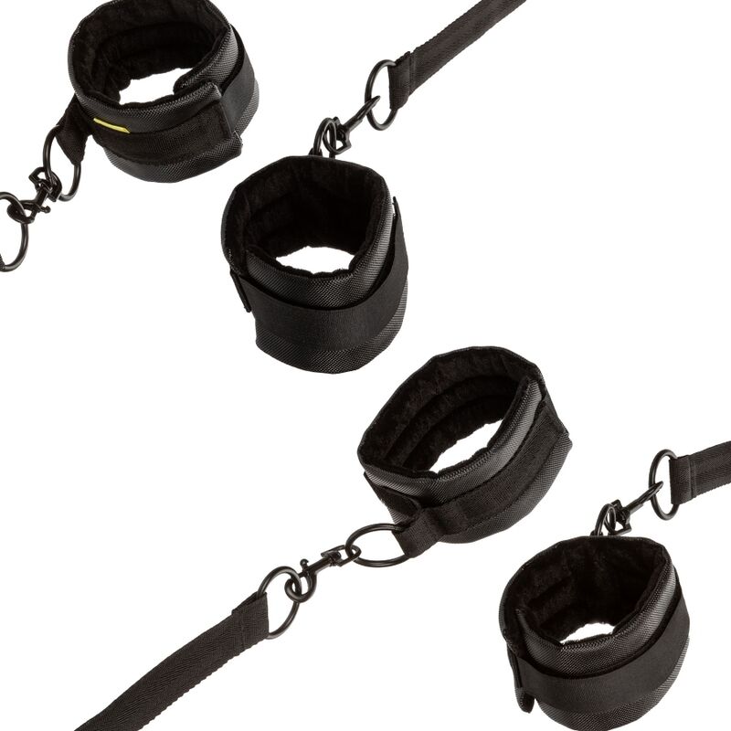 CalExotics Boundless Bed Restraint features 4 adjustable cuffs, under-bed tethers, plush lining, and swivel clasps for comfortable and secure bondage play.2